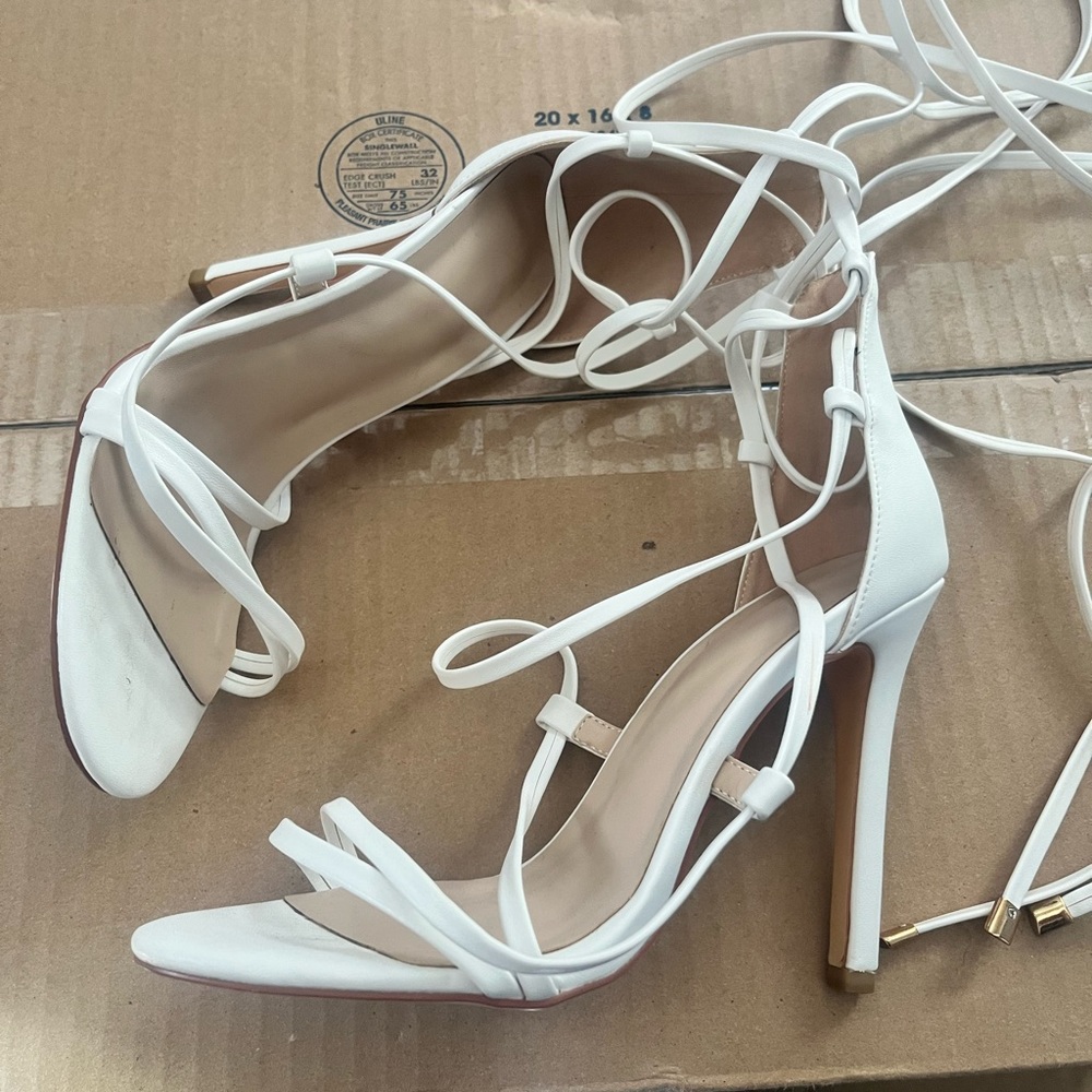 Selling my size 7 (EU 37) strappy white heels. Worn once.